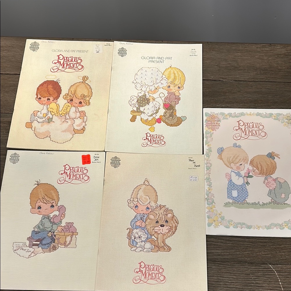 Vintage Precious Moments Cross Stitch books
1-4 1980’s and 31- 1993 - 5 books